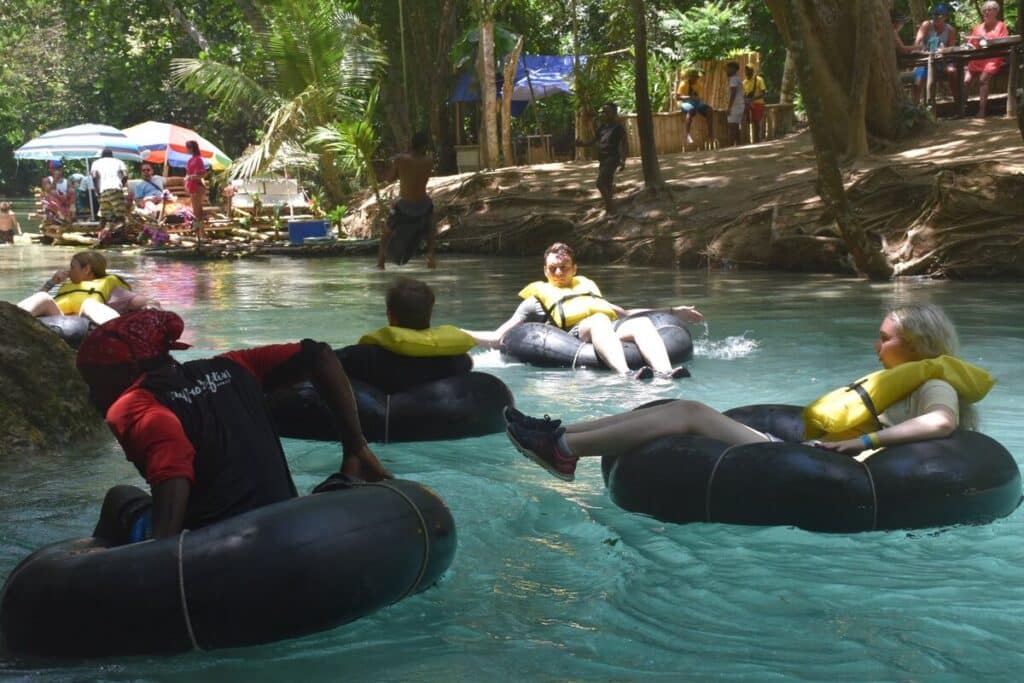 River tubing on the White River Jamaica at Calypso Rafting with yellow life vests
