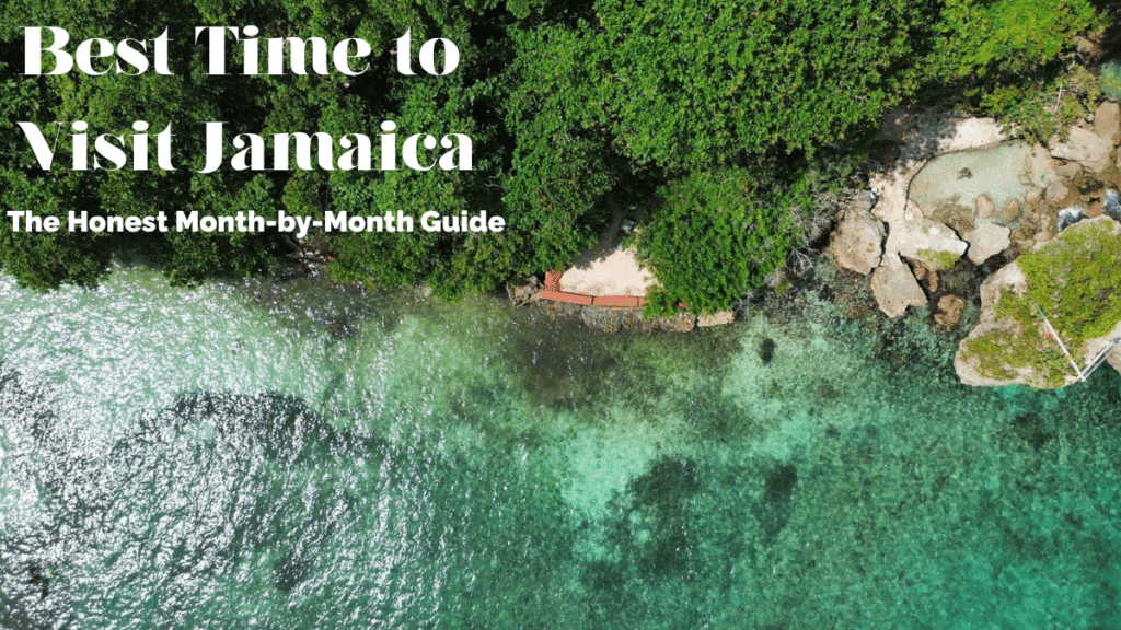 Aerial view of a secluded turquoise cove on Jamaica's coast — the best time to visit Jamaica varies by season and location.